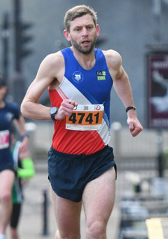 This photo is of Aaron Burgess. It was taken by John Harvey